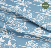 Digitally Printed Christmas Fabric with a White Silhouette Pattern on a New Year's Themed Blue Background